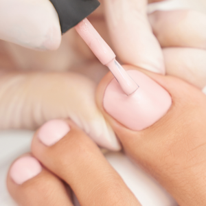 Pedicure Close up Light Pink Polish Pedicurist Nail Salon